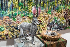 Robin Raznick, Jill and the Babes, 2022. Ceramic, acrylic paint, desert sand, raffia, and feathers, 24" x 30" x 15"