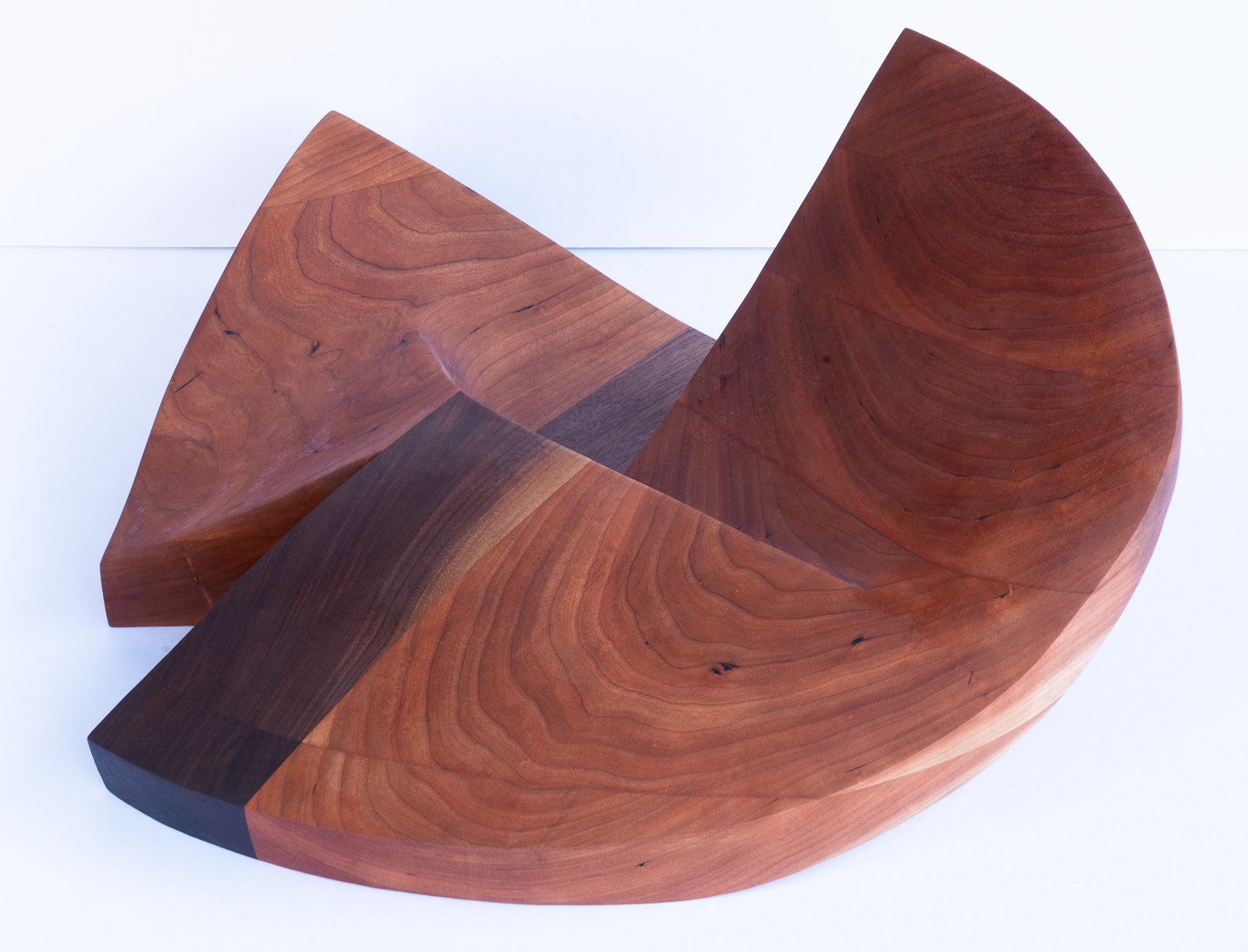 Ross  Stockwell, A Restless Object, 2022. Wood (cherry, walnut), 20” x 18.5” x 9”.