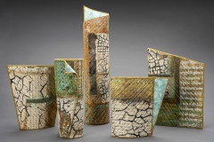 Viviana  Lombrozo, Precarious Vessels, 2023. Hand-dyed, printed, and painted cotton fabric (be the artist), commercial fabric, thread, interfacing, batting, 17” x 24” x 12”.