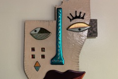 Karen Surbeck, Ambiguous, 2026. Clay, raku glazes, and dichroic glass, 23.25" x 15”.