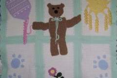 Tanis Galik, Toyland, 2024. Crochet, 27" x 29".