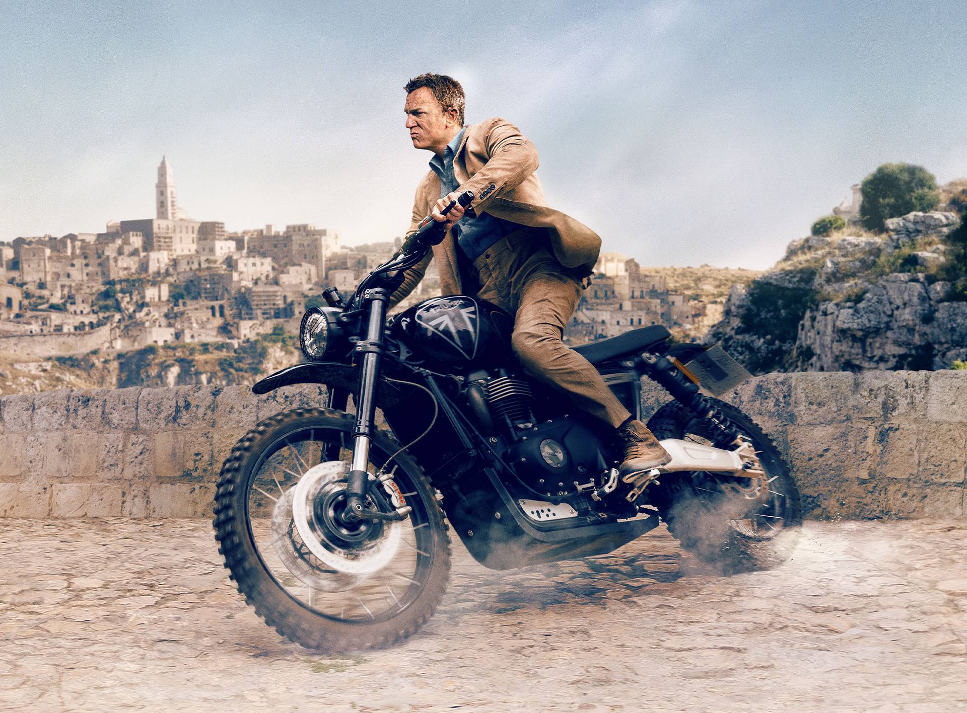 A Triumph Scrambler bike was used in a James Bond film. A Triumph Scrambler bike was used in a James Bond film.