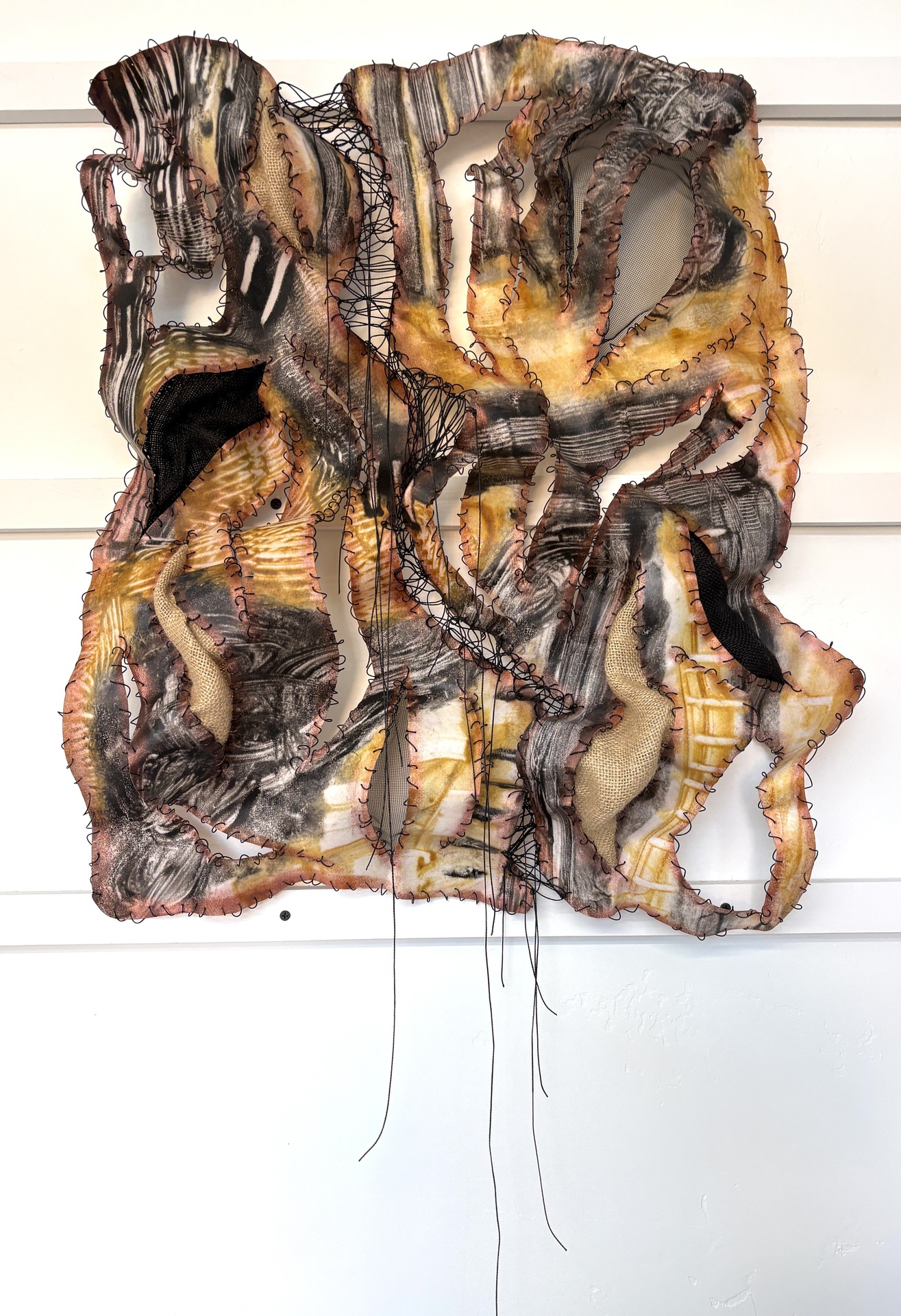 Birdy Harrison, Made Whole, 2026. Encaustic monotypes and mixed media, 26 x 22 x 5. $1025 Birdy Harrison, Made Whole, 2026. Encaustic monotypes and mixed media, 26 x 22 x 5. $1025